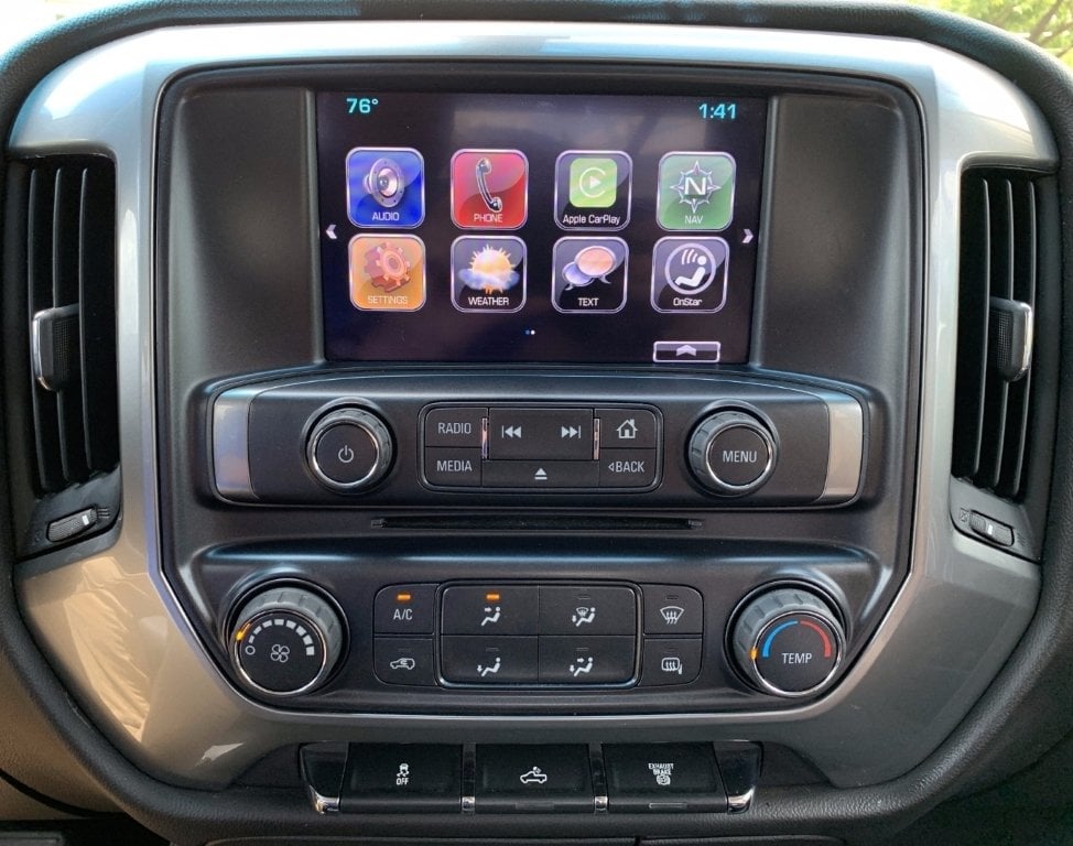 Sierra CarPlay upgrade shown on factory touchscreen with apps visible