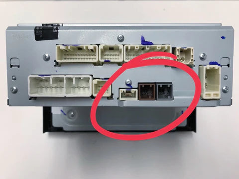 Close view of white, brown and grey ports on Toyota XM SAt